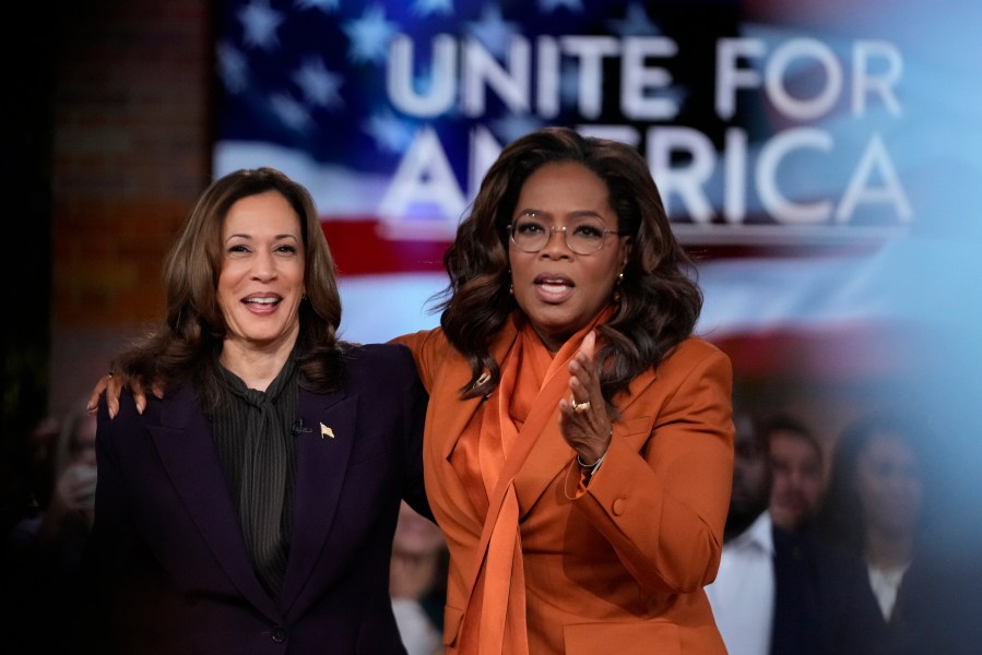 Democratic presidential nominee Vice President Kamala Harris joins Oprah Winfrey at Oprah's Unite for America Live Streaming event Thursday, Sept. 19, 2024 in Farmington Hills, Mich. (AP Photo/Paul Sancya)