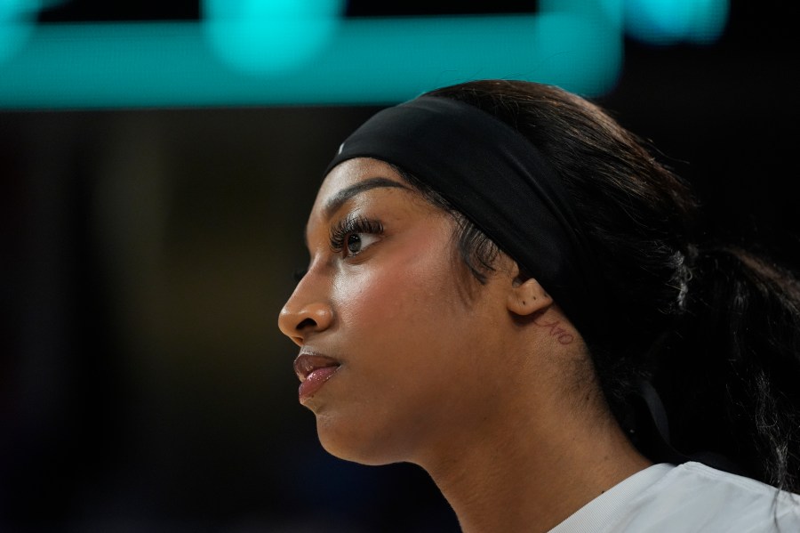 Chicago Sky's Angel Reese warms up before a WNBA basketball game against the Indiana Fever, Friday, Aug. 30, 2024, in Chicago. (AP Photo/Erin Hooley)