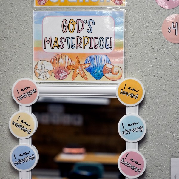 A mirror with a lesson to show students affirmation is seen in a fourth grade classroom at the Winter Garden Christian Academy Thursday, Aug. 29, 2024, in Winter Garden, Fla. (AP Photo/John Raoux)