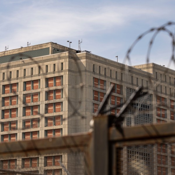 The Metropolitan Detention Center is seen through barb wire in the Sunset Park neighborhood of the Brooklyn borough of New York, Thursday, Sept. 19, 2024. (AP Photo/Yuki Iwamura)