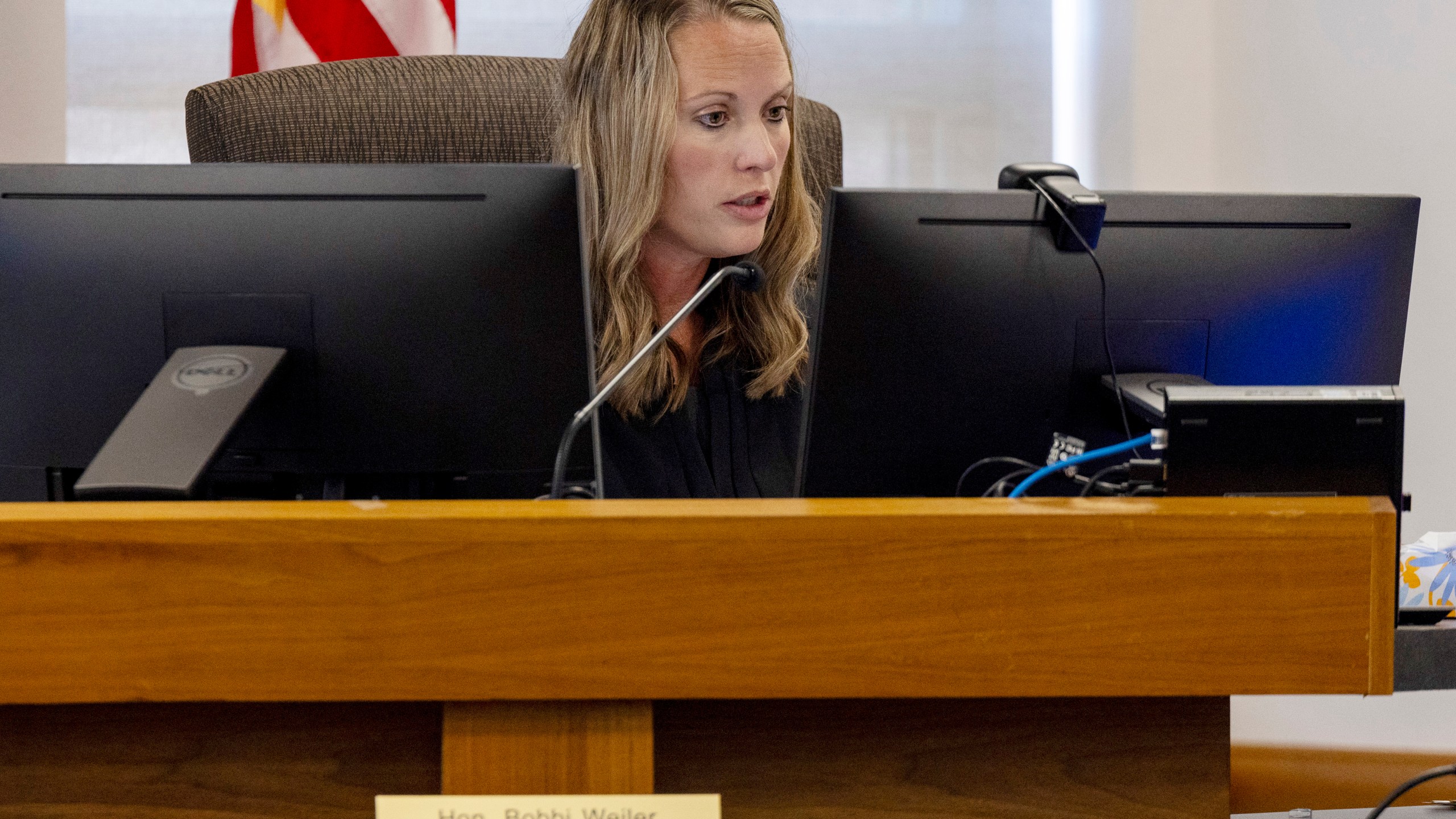 Morton County District Judge Bobbi Weiler recites nine charges, including homicide and possession of foreign substances, on a zoom call during Ian Cramer's plea change hearing at the Morton County Courthouse on Friday, Sept. 20, 2024, in Mandan, N.D. (Tanner Ecker/The Bismarck Tribune via AP)