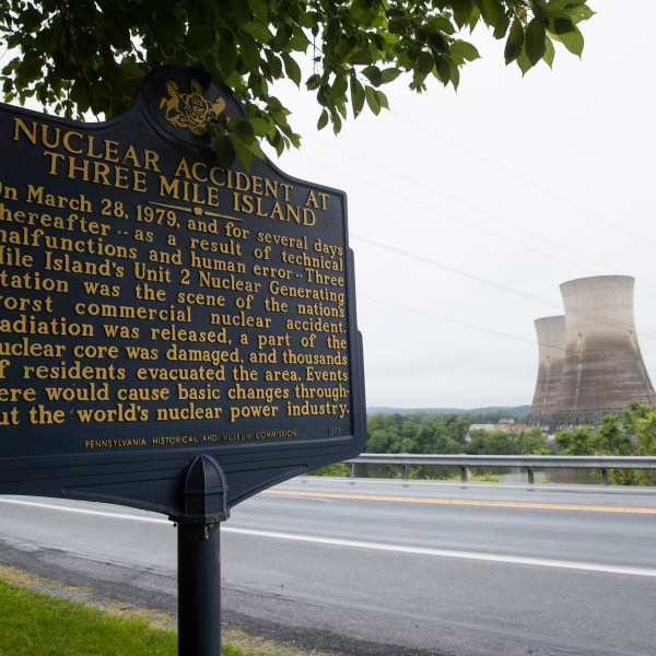 FILE - Shown are the unit 2 cooling towers at the Three Mile Island nuclear power plant in Middletown, Pa., Monday, May 22, 2017. (AP Photo/Matt Rourke, File)