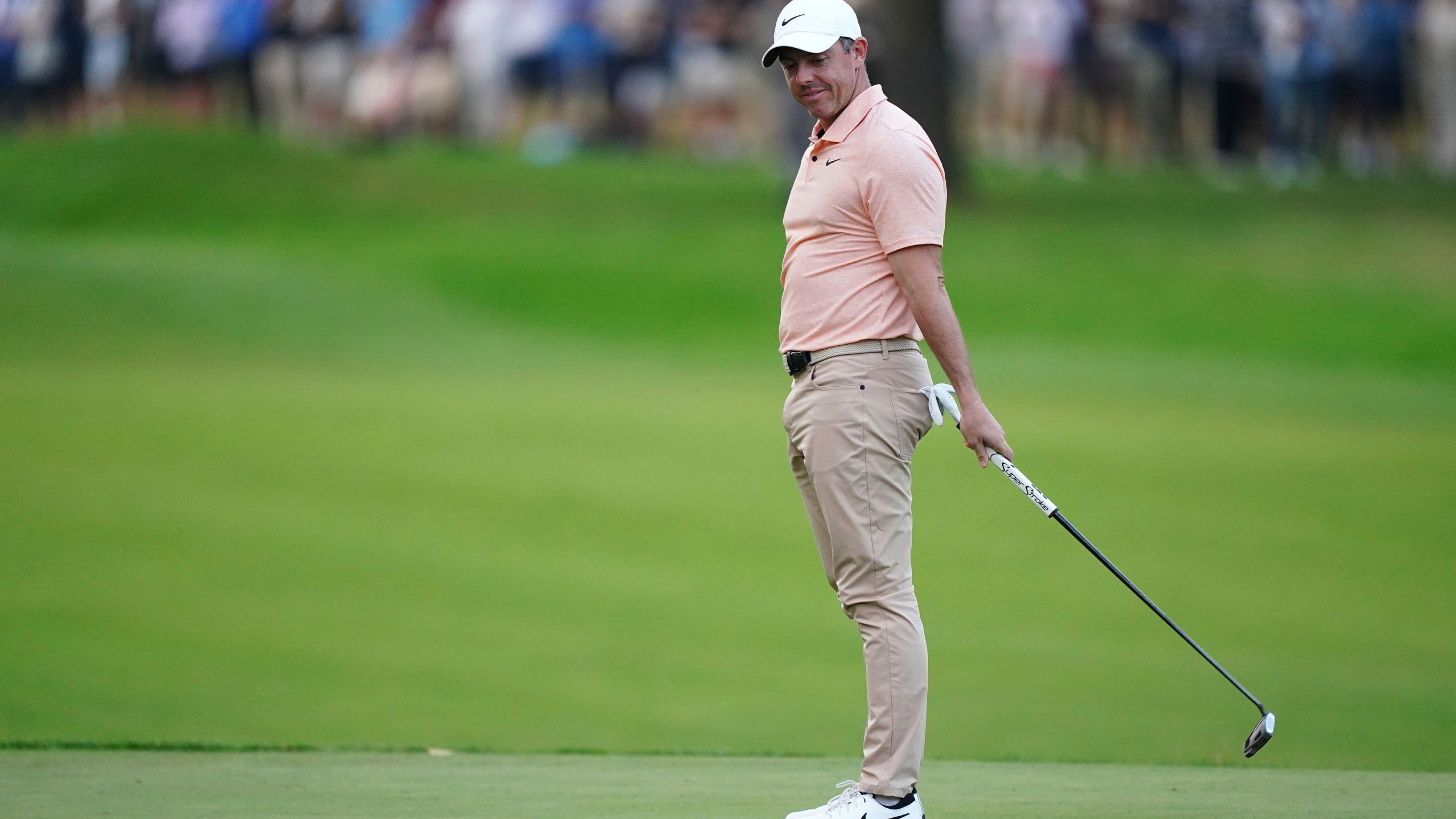 Northern Ireland's Rory McIlroy reacts after missing his birdie putt on the 18th during day two of the 2024 BMW PGA Championship at Wentworth Golf Club in Virginia Water, England, Friday Sept. 20, 2024. (Zac Goodwin/PA via AP)