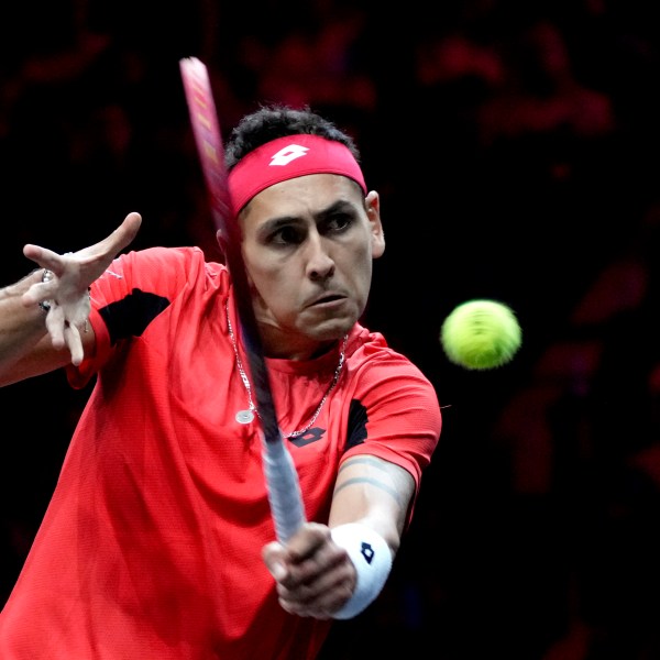 Team World's Alejandro Tabilo returns the ball during his singles tennis match against team Europe's Grigor Dimitrov on the first day of the Laver Cup tennis tournament at the Uber arena in Berlin, Germany, Friday, Sept. 20, 2024. (AP Photo/Ebrahim Noroozi)