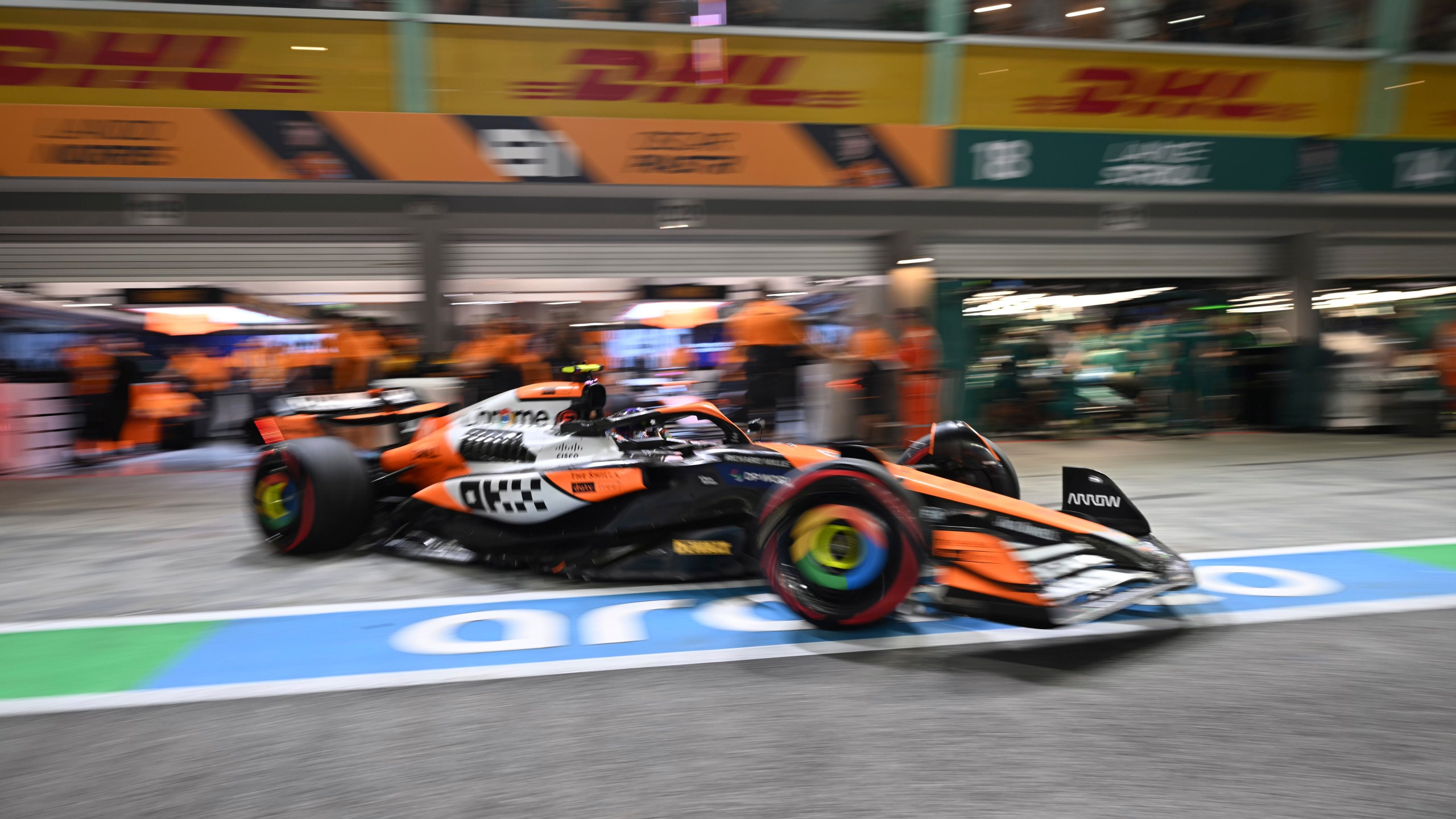 McLaren driver Lando Norris of Britain leaves the pit lane during the qualifying session of the Singapore Formula One Grand Prix at the Marina Bay Street Circuit, in Singapore, Saturday, Sept. 21, 2024. (Mohd Rasfan/Pool Photo via AP)