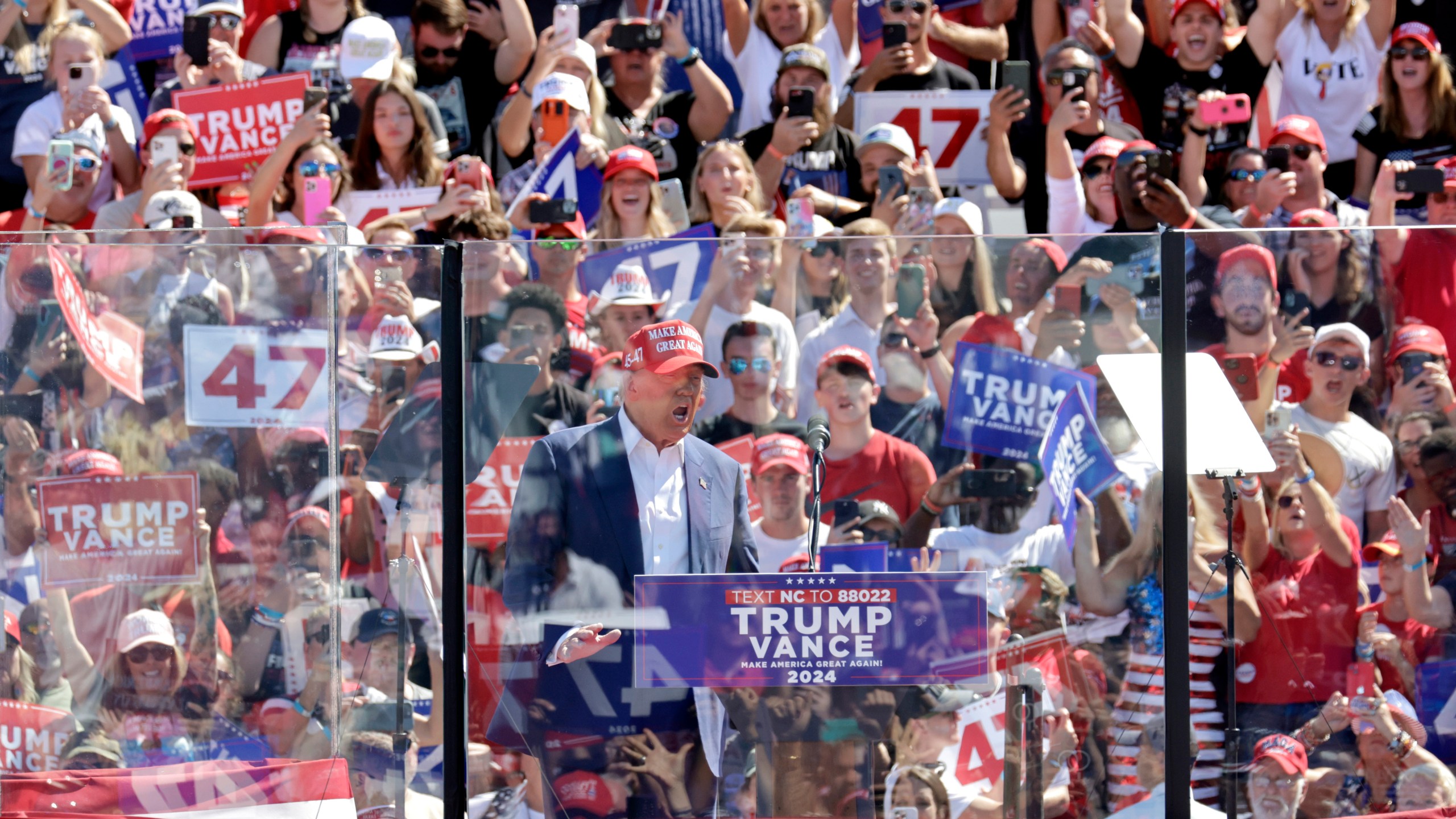 Republican presidential nominee former President Donald Trump speaks at a campaign rally at Wilmington International Airport in Wilmington, N.C., Saturday, Sept. 21, 2024. (AP Photo/Chris Seward)