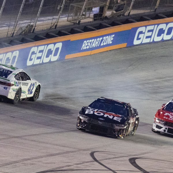 John Hunter Nemechek (42) spins while coming out of Turn 4 as Kaz Grala (15) and Josh Bilicki (66) avoid him during a NASCAR Cup Series auto race, Saturday, Sept. 21, 2024, in Bristol, Tenn. (AP Photo/Wade Payne)