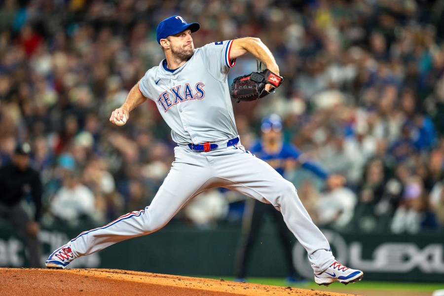 Texas Rangers starter Max Scherzer delivers a pitch during the first inning of a baseball game against the Texas Rangers, Saturday, Sept. 14, 2024, in Seattle. (AP Photo/Stephen Brashear)