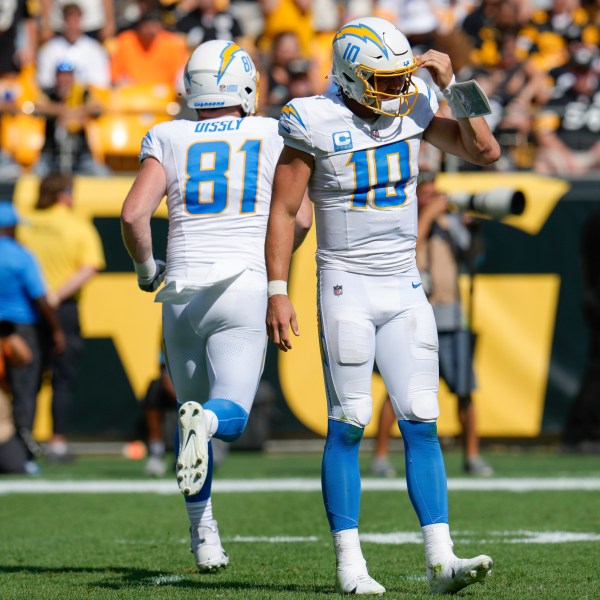 Los Angeles Chargers quarterback Justin Herbert (10) walks off the field after being sacked by Pittsburgh Steelers linebacker Elandon Roberts during the second half of an NFL football game, Sunday, Sept. 22, 2024, in Pittsburgh. (AP Photo/Gene J. Puskar)