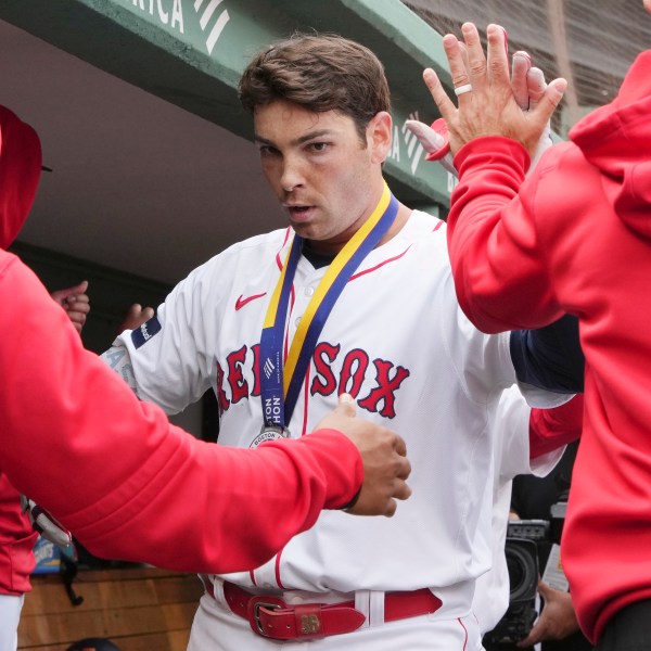 Boston Red Sox's Triston Casas celebrates after his three-run home run during the third inning of the first game of a baseball doubleheader against the Minnesota Twins, Sunday, Sept. 22, 2024, in Boston. (AP Photo/Michael Dwyer)