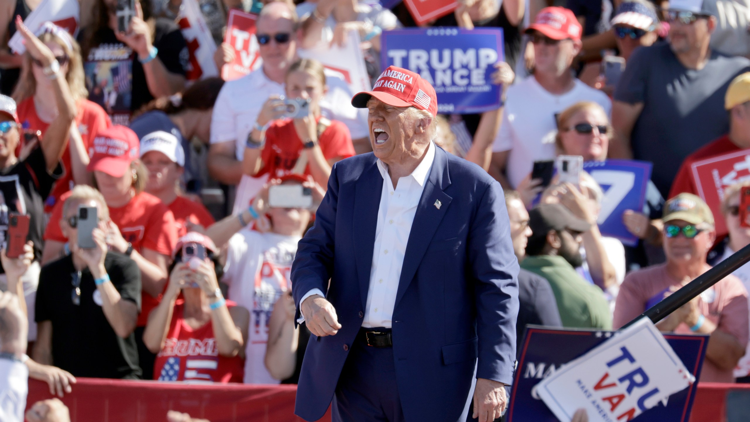 Republican presidential nominee former President Donald Trump shouts after speaking at a campaign event at Wilmington International Airport in Wilmington, N.C., Saturday, Sept. 21, 2024. (AP Photo/Chris Seward)