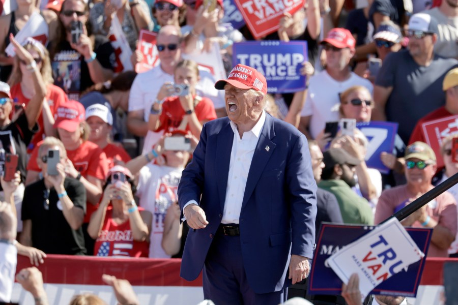 Republican presidential nominee former President Donald Trump shouts after speaking at a campaign event at Wilmington International Airport in Wilmington, N.C., Saturday, Sept. 21, 2024. (AP Photo/Chris Seward)