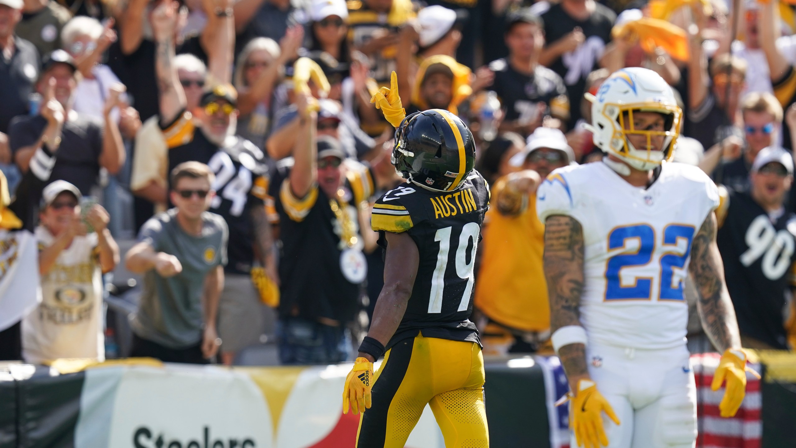 Pittsburgh Steelers wide receiver Calvin Austin III (19) celebrates after scoring a touchdown during the second half of an NFL football game against the Los Angeles Chargers, Sunday, Sept. 22, 2024, in Pittsburgh. (AP Photo/Matt Freed)