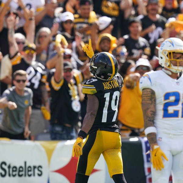 Pittsburgh Steelers wide receiver Calvin Austin III (19) celebrates after scoring a touchdown during the second half of an NFL football game against the Los Angeles Chargers, Sunday, Sept. 22, 2024, in Pittsburgh. (AP Photo/Matt Freed)