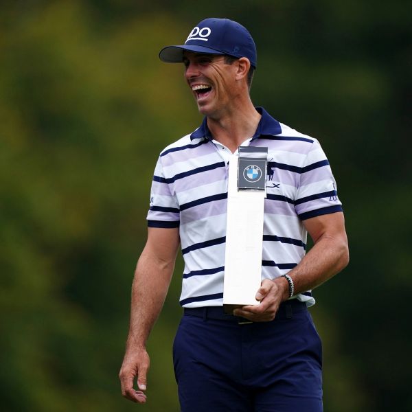 Billy Horschel of the U.S. displays the trophy following day four of the PGA Championship at Wentworth Golf Club in Virginia Water, England, Sunday Sept. 22, 2024. (Zac Goodwin/PA via AP)