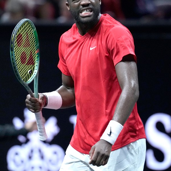 Team World's Frances Tiafoe reacts after his singles tennis match against Team Europe's Alexander Zverev on the third day of the Laver Cup tennis tournament, at the Uber arena in Berlin, Germany, Sunday, Sept. 22, 2024. (AP Photo/Ebrahim Noroozi)