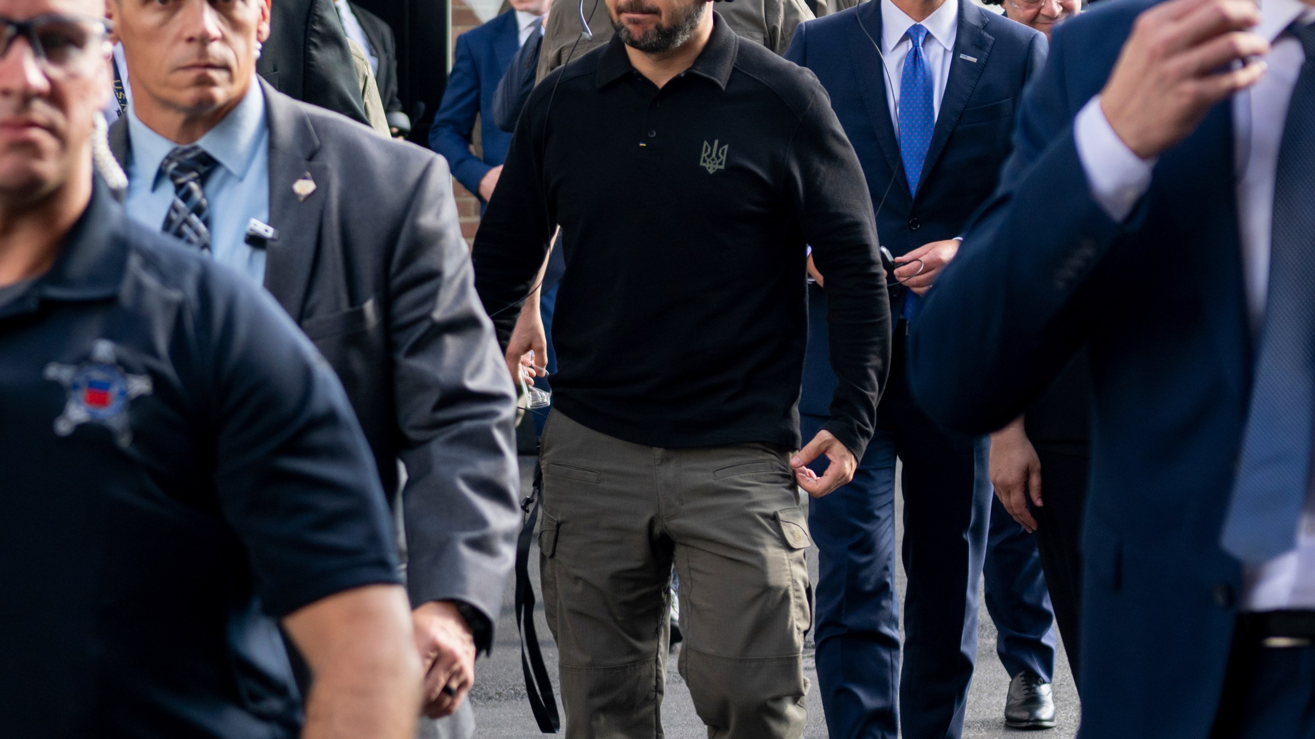 In this photo provided by the U.S. Army, Ukrainian President Volodymyr Zelenskyy, center, tours the Scranton Army Ammunition Plant in Scranton, Pa., Sunday, Sept. 22, 2024. (Staff Sgt. Deonte Rowell/U.S. Army via AP)