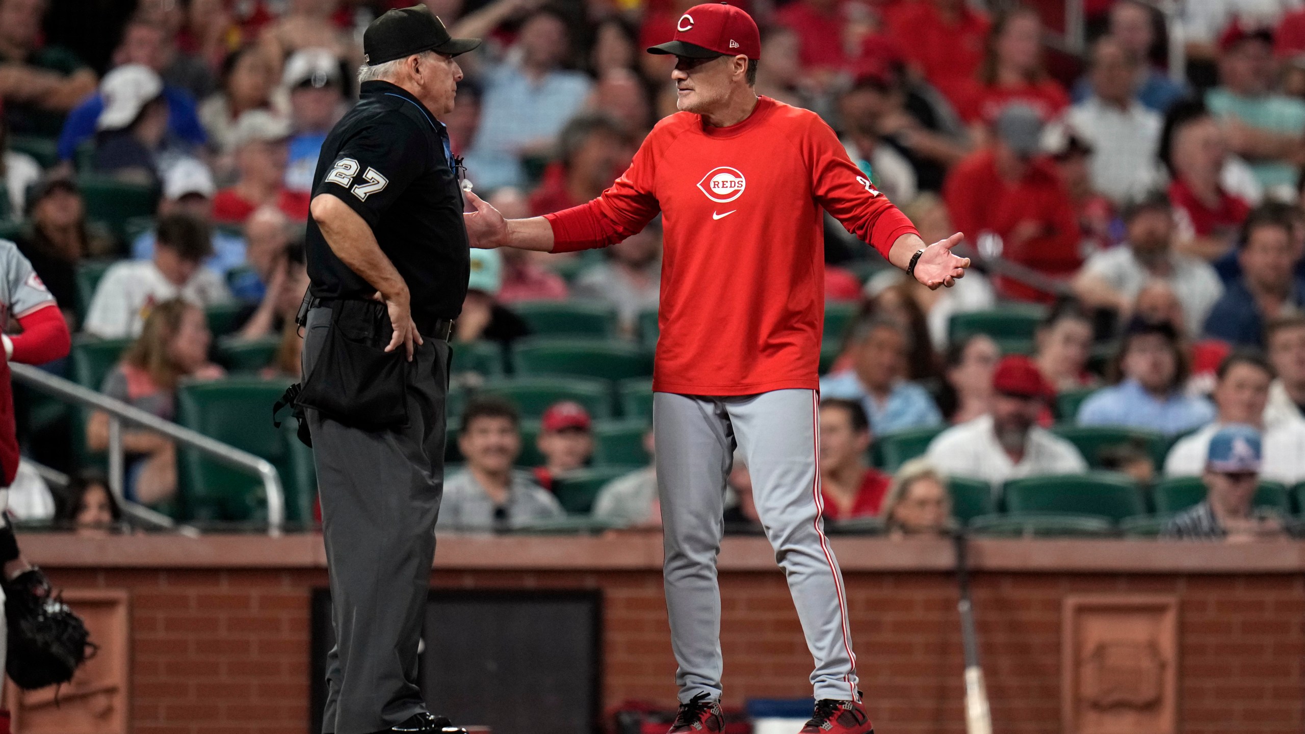 FILE - Cincinnati Reds manager David Bell, right, argues after being ejected by home plate umpire Larry Vanover, left, during the sixth inning of a baseball game against the St. Louis Cardinals, Sept. 10, 2024, in St. Louis. (AP Photo/Jeff Roberson, File)