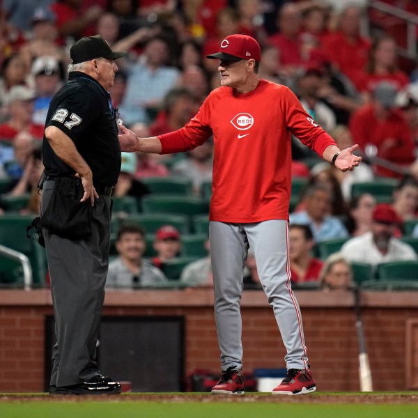 FILE - Cincinnati Reds manager David Bell, right, argues after being ejected by home plate umpire Larry Vanover, left, during the sixth inning of a baseball game against the St. Louis Cardinals, Sept. 10, 2024, in St. Louis. (AP Photo/Jeff Roberson, File)