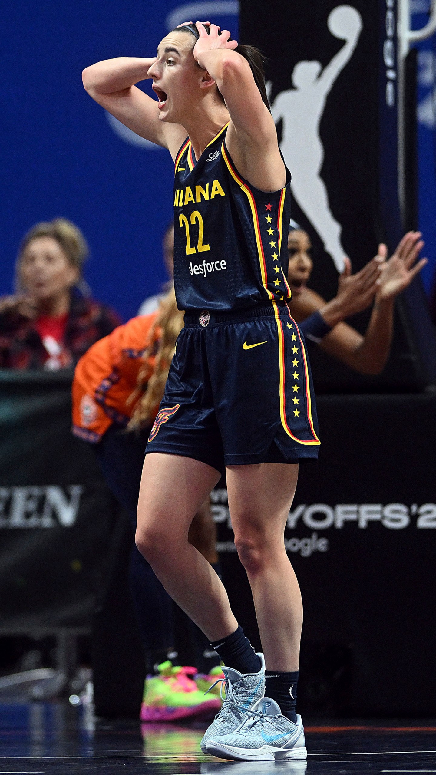 Indiana Fever's Caitlin Clark (22) reacts after a foul call during a first-round WNBA basketball playoff game against the Connecticut Sun at Mohegan Sun Arena, Sunday, Sept. 22, 2024. (Sarah Gordon/The Day via AP)