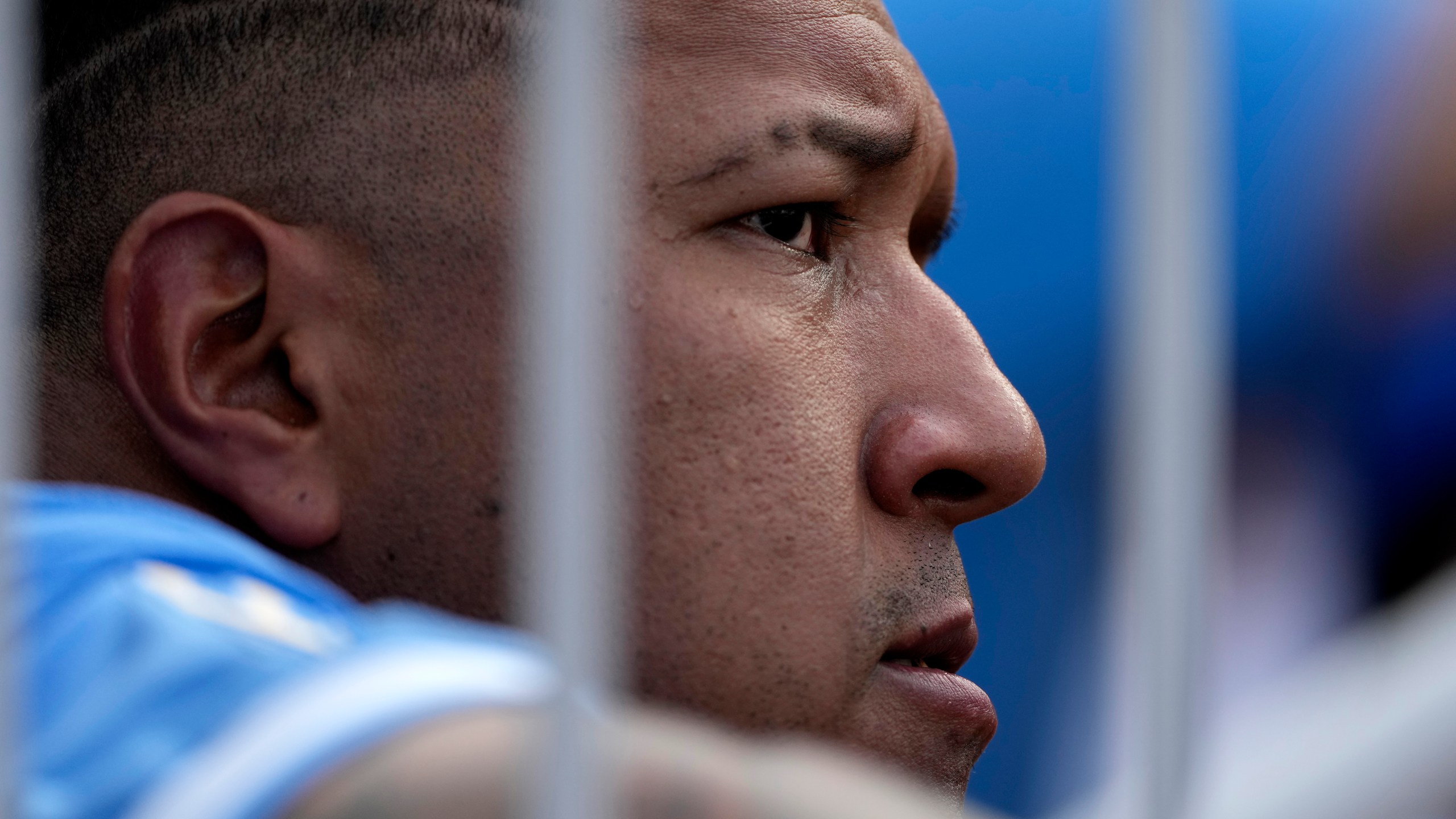 Kansas City Royals' Salvador Perez watches from the dugout during the fourth inning of a baseball game against the San Francisco Giants Saturday, Sept. 21, 2024, in Kansas City, Mo. (AP Photo/Charlie Riedel)