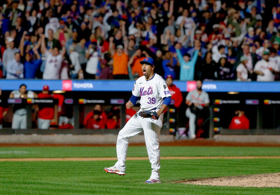 New York Mets relief pitcher Edwin Diaz reacts after striking out Kody Clemens for the final out during a baseball game against the Philadelphia Phillies, Sunday, Sept. 22, 2024, in New York. (AP Photo/John Munson)