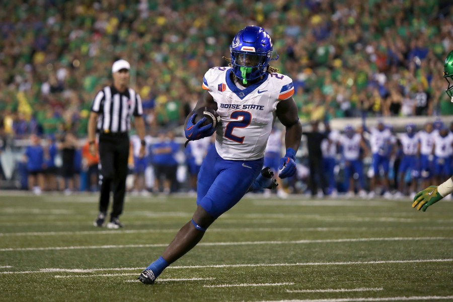 Boise State running back Ashton Jeanty (2) runs the ball during the first half of an NCAA college football game against Oregon, Saturday, Sept. 7, 2024, at Autzen Stadium in Eugene, Ore. (AP Photo/Lydia Ely)