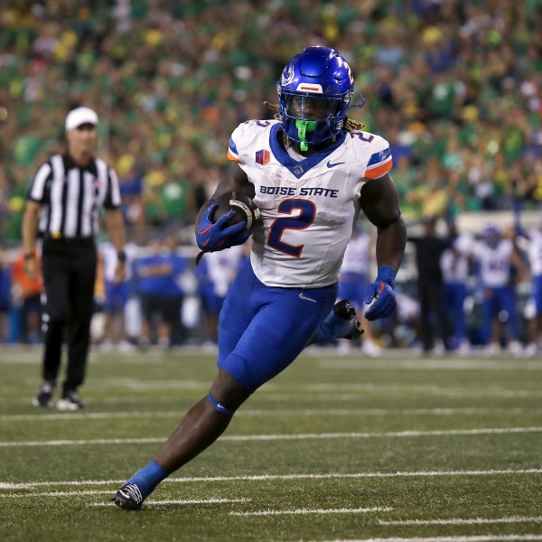 Boise State running back Ashton Jeanty (2) runs the ball during the first half of an NCAA college football game against Oregon, Saturday, Sept. 7, 2024, at Autzen Stadium in Eugene, Ore. (AP Photo/Lydia Ely)