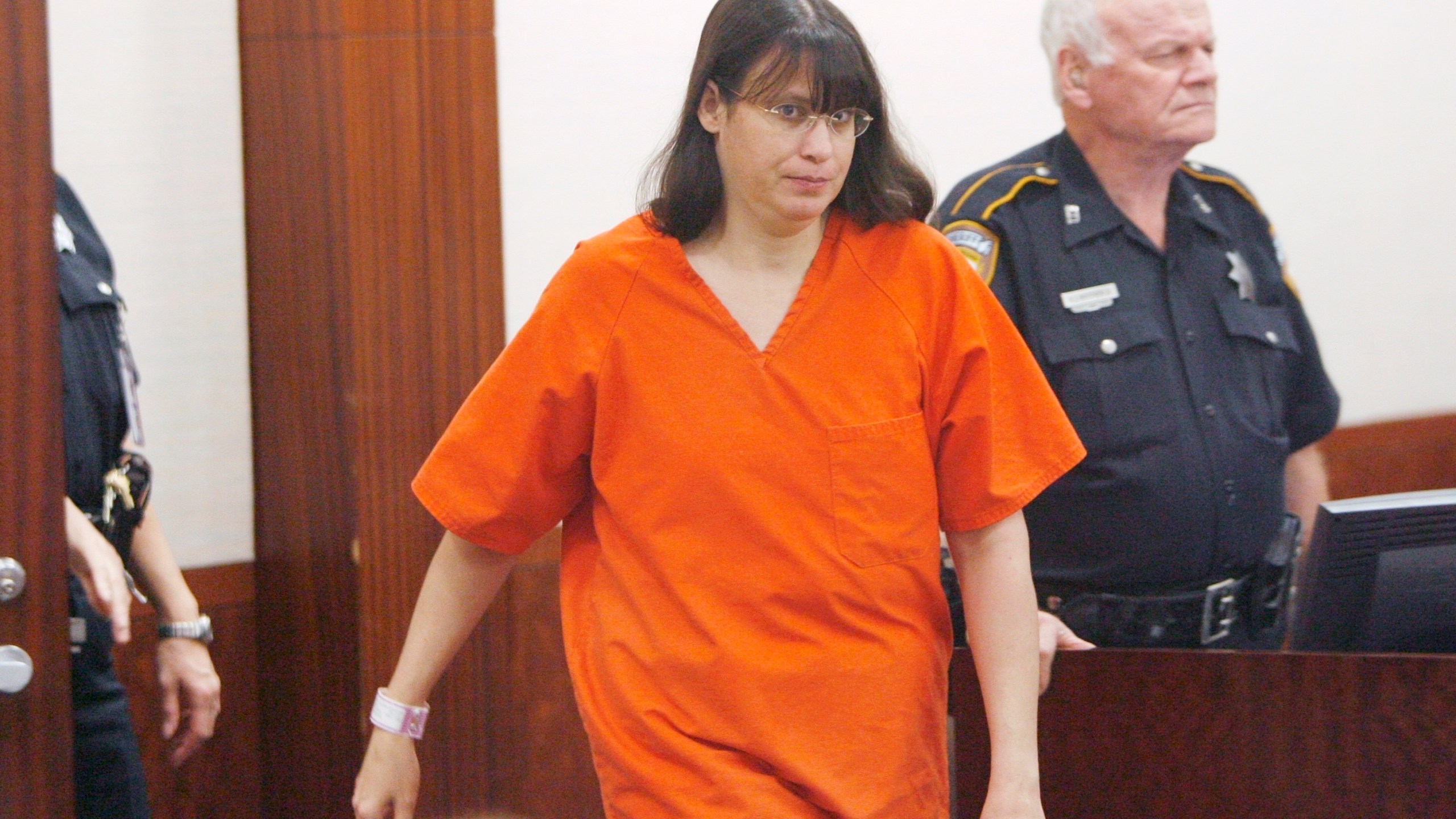 FILE - Andrea Yates walks into the courtroom for a hearing, July 27, 2006, in Houston, where she was committed to the maximum-security North Texas State Hospital in Vernon, Texas. (Brett Coomer/Houston Chronicle via AP, Pool, File)