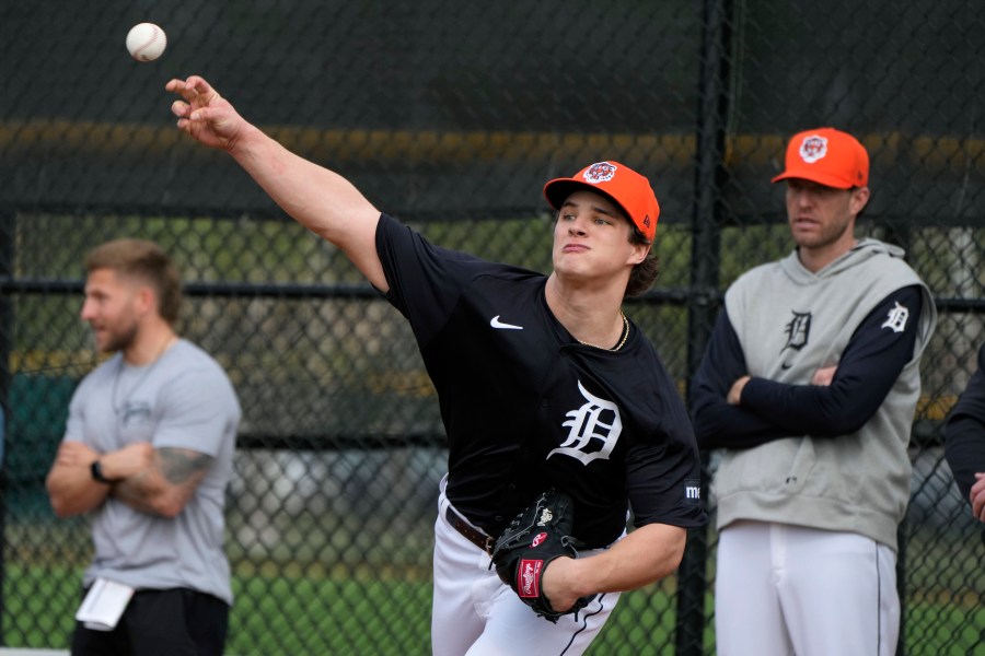 FILE - Detroit Tigers pitcher Jackson Jobe throws during a baseball spring training workout Feb. 16, 2024, in Lakeland, Fla. (AP Photo/Charlie Neibergall, File)