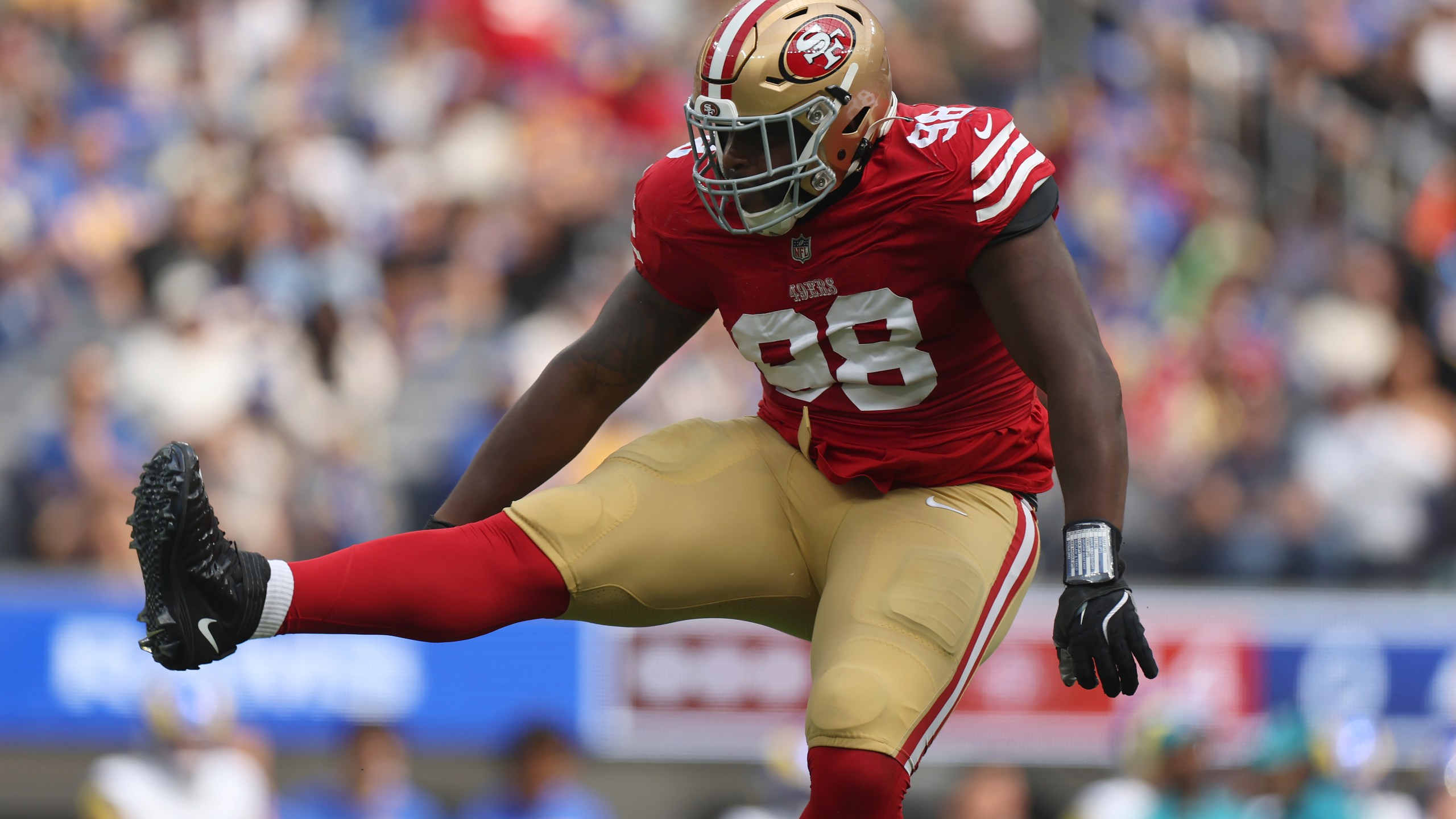 San Francisco 49ers defensive tackle Javon Hargrave (98) celebrates after sacking Los Angeles Rams quarterback Matthew Stafford during the first half of an NFL football game, Sunday, Sept. 22, 2024, in Inglewood, Calif. (AP Photo/Ryan Sun)