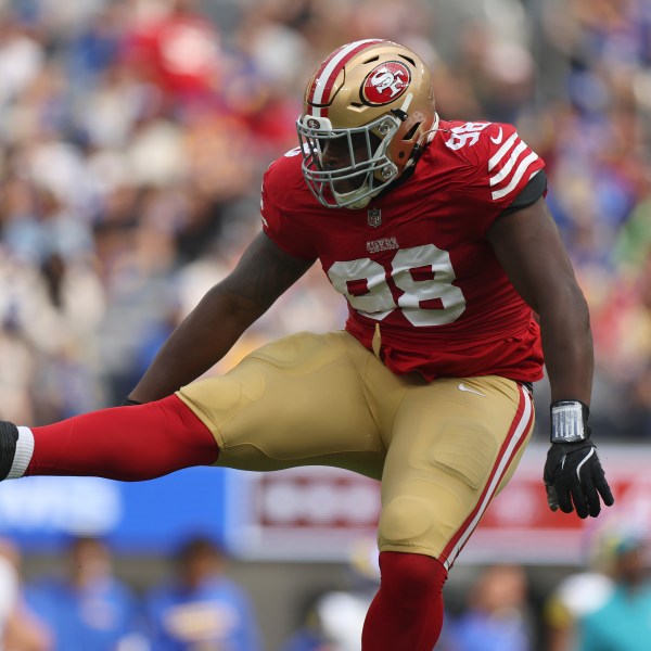 San Francisco 49ers defensive tackle Javon Hargrave (98) celebrates after sacking Los Angeles Rams quarterback Matthew Stafford during the first half of an NFL football game, Sunday, Sept. 22, 2024, in Inglewood, Calif. (AP Photo/Ryan Sun)