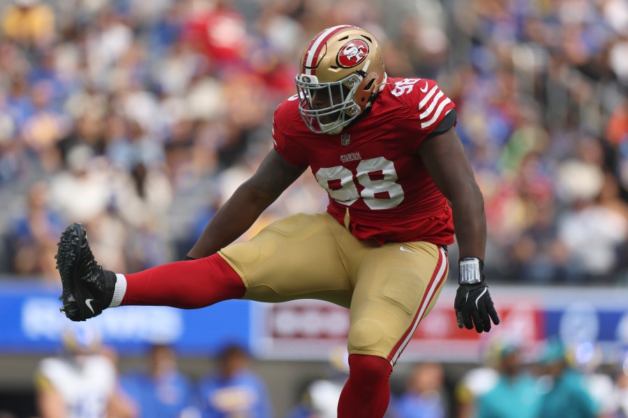 San Francisco 49ers defensive tackle Javon Hargrave (98) celebrates after sacking Los Angeles Rams quarterback Matthew Stafford during the first half of an NFL football game, Sunday, Sept. 22, 2024, in Inglewood, Calif. (AP Photo/Ryan Sun)