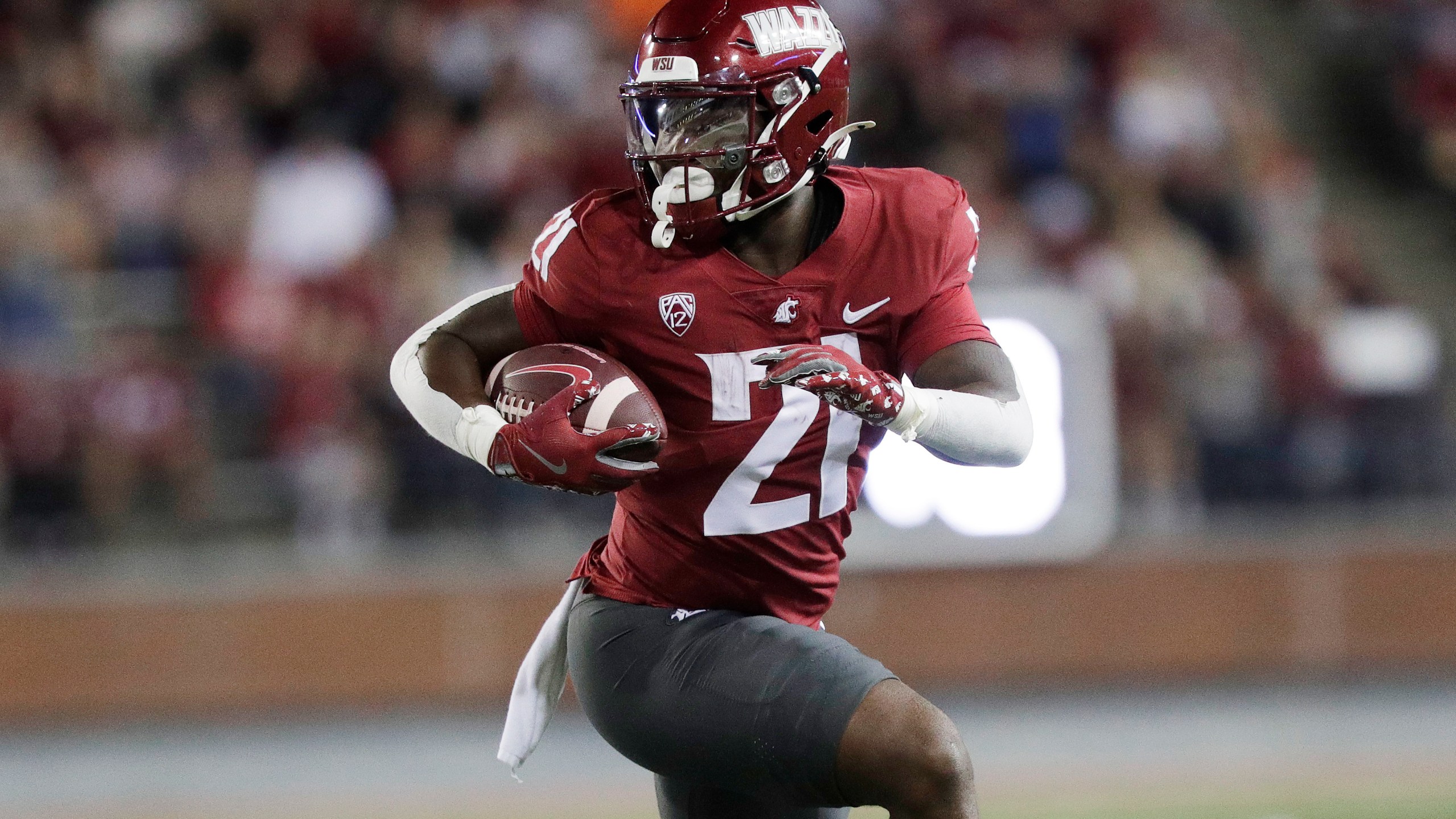 Washington State running back Wayshawn Parker carries the ball during the first half of an NCAA college football game against San Jose State, Friday, Sept. 20, 2024, in Pullman, Wash. (AP Photo/Young Kwak)