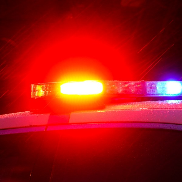 FILE - A police vehicle flashes its lights in Philadelphia, Monday, Jan. 17, 2022. (AP Photo/Matt Rourke, File)