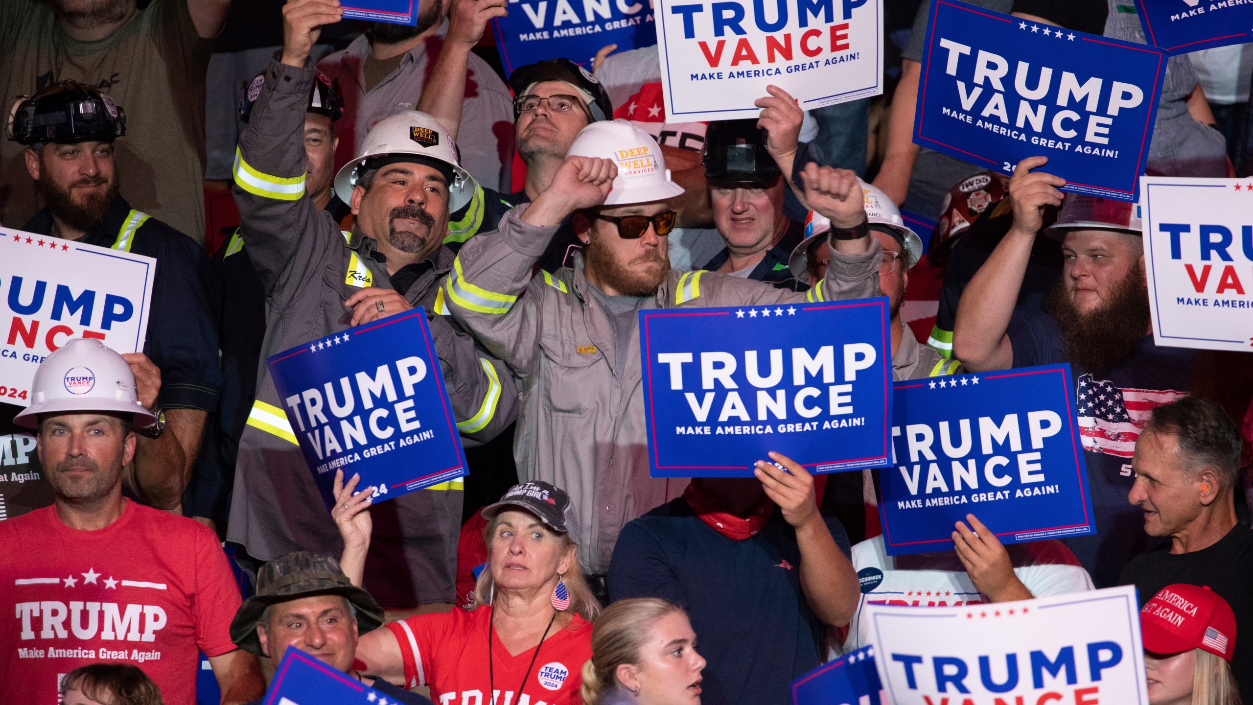 Members of the crowd dance as they wait for Republican presidential nominee former President Donald Trump to begin speaking during a campaign rally at Ed Fry Arena in Indiana, Pa., Monday, Sept. 23, 2024. (AP Photo/Rebecca Droke)