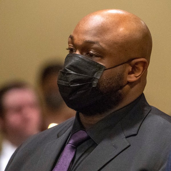 FILE - Former Memphis police officer, Desmond Mills Jr., accused of murder in the death of Tyre Nichols, appears with his attorney at an indictment hearing at the Shelby County Criminal Justice Center in Memphis, Tenn., Feb. 17, 2023. (AP Photo/Brandon Dill, File)