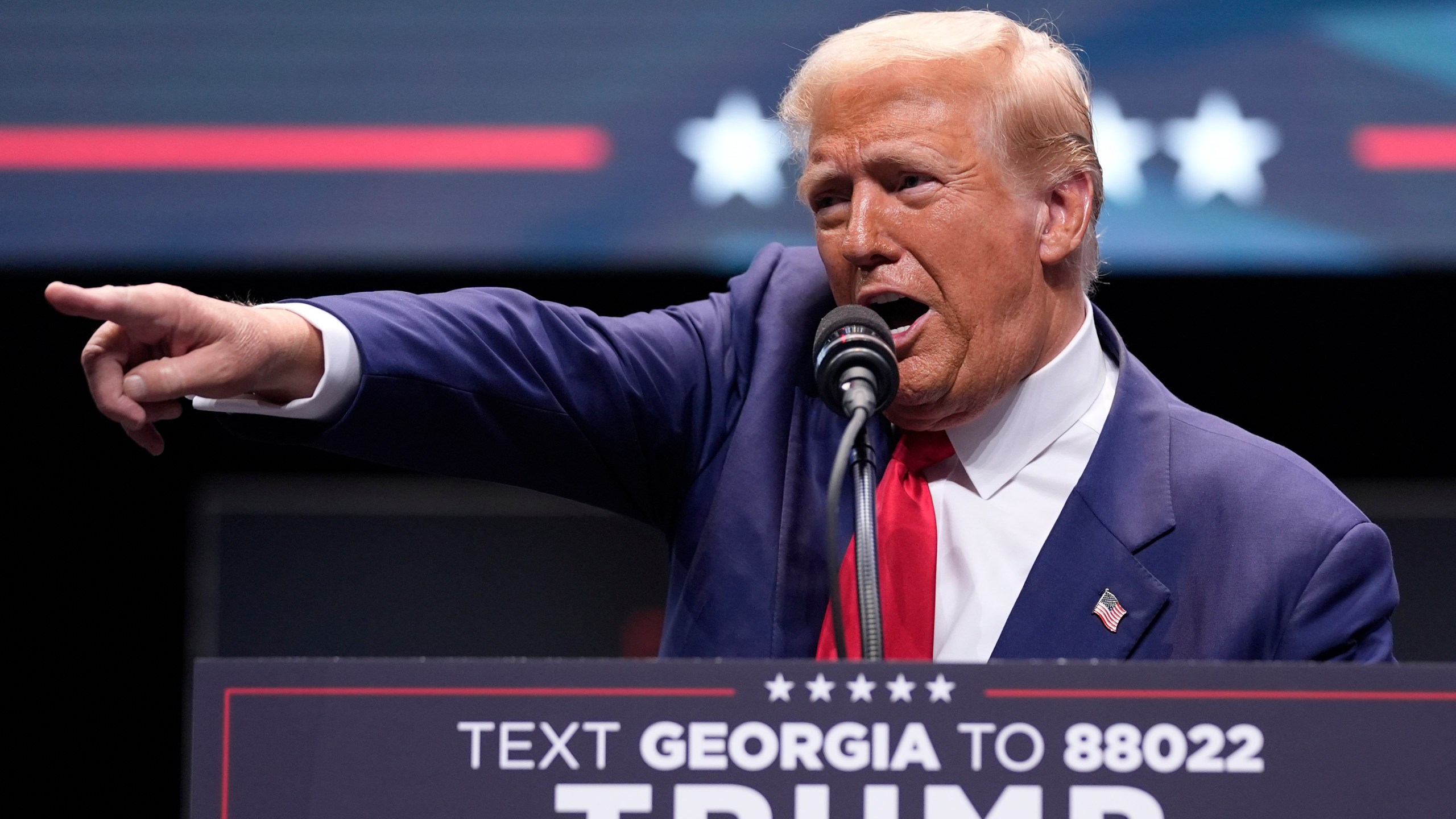 Republican presidential nominee former President Donald Trump speaks about the tax code and manufacturing at the Johnny Mercer Theatre Civic Center, Tuesday, Sept. 24, 2024, in Savannah, Ga. (AP Photo/Evan Vucci)