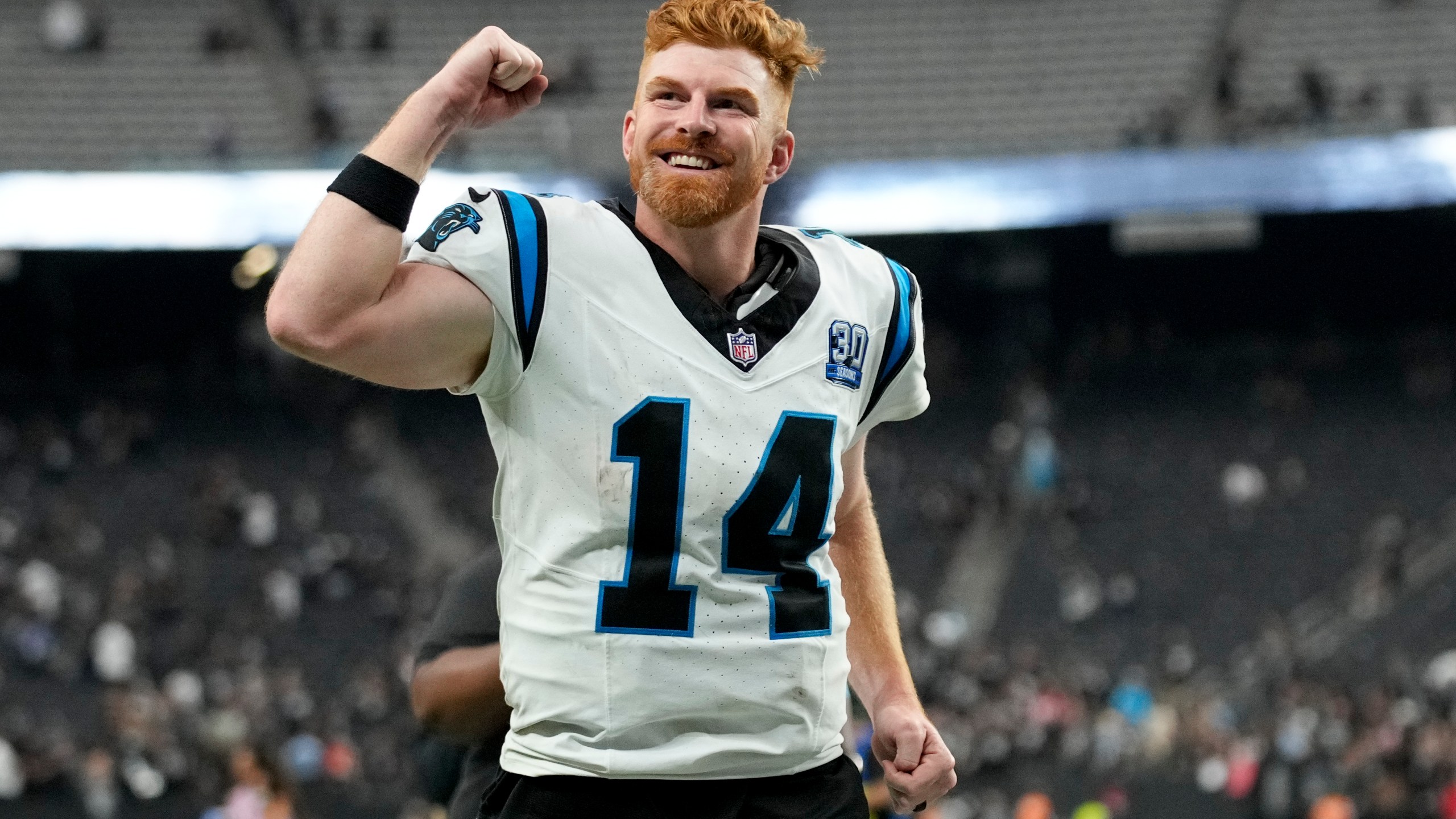 Carolina Panthers quarterback Andy Dalton celebrates after their win against the Las Vegas Raiders in an NFL football game, Sunday, Sept. 22, 2024, in Las Vegas. (AP Photo/John Locher)