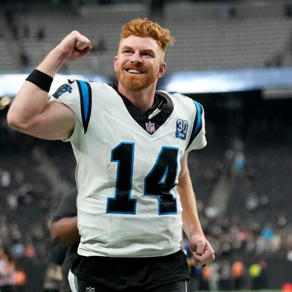 Carolina Panthers quarterback Andy Dalton celebrates after their win against the Las Vegas Raiders in an NFL football game, Sunday, Sept. 22, 2024, in Las Vegas. (AP Photo/John Locher)