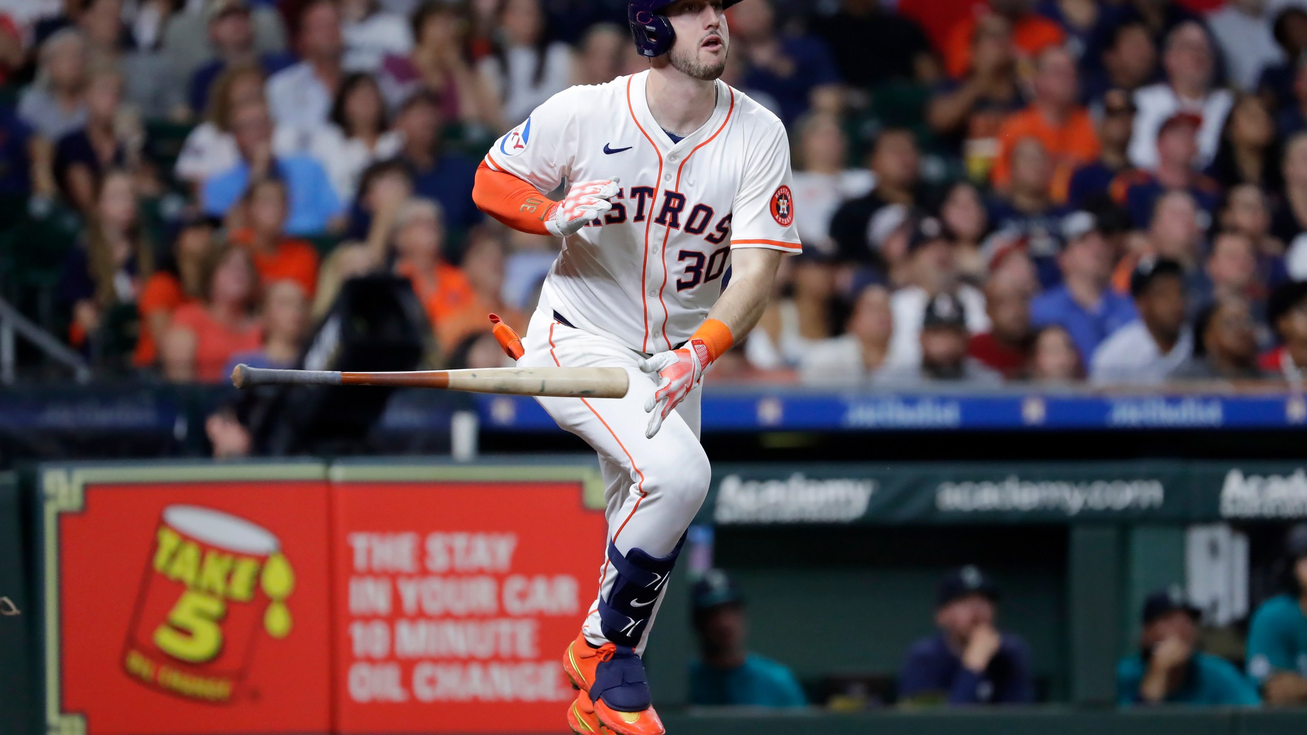 Houston Astros' Kyle Tucker flips his bat as he watches his solo home run during the fourth inning of a baseball game against the Seattle Mariners, Tuesday, Sept. 24, 2024, in Houston. (AP Photo/Michael Wyke)