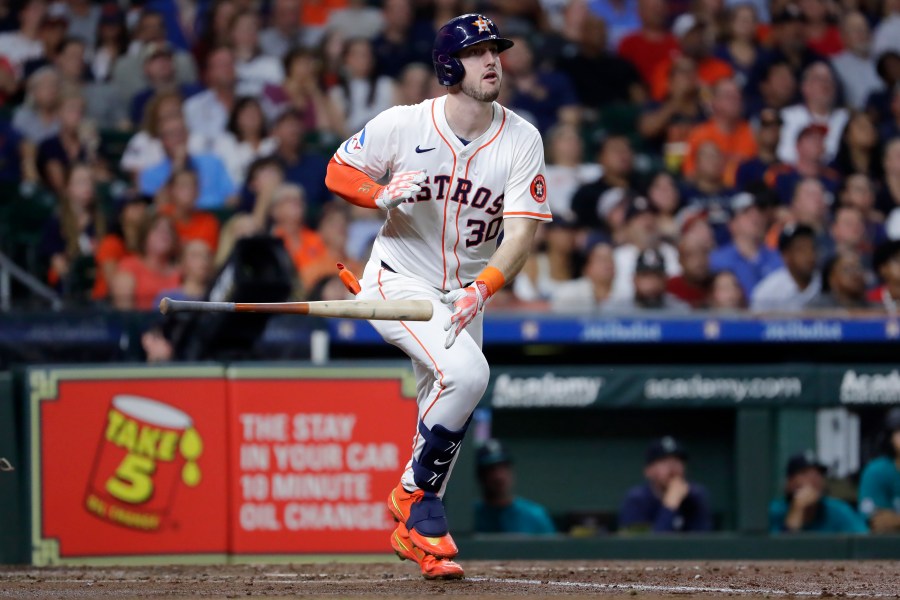 Houston Astros' Kyle Tucker flips his bat as he watches his solo home run during the fourth inning of a baseball game against the Seattle Mariners, Tuesday, Sept. 24, 2024, in Houston. (AP Photo/Michael Wyke)