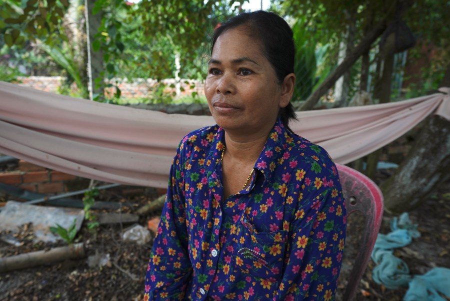 Norng La, a villager who lives along the Funan Techo Canal, is interviewed by The Associated Press at her home at Prek Takeo village eastern Phnom Penh Cambodia, Tuesday, July 30, 2024. (AP Photo/Heng Sinith)