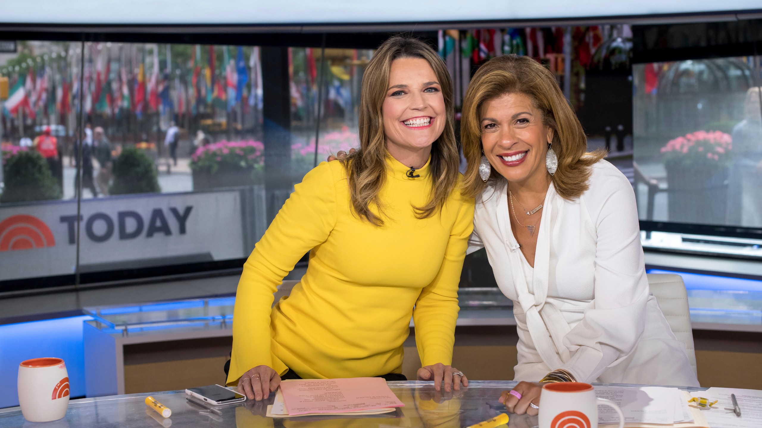 FILE - Co-anchors Savannah Guthrie, left, and Hoda Kotb pose on set of the "Today" show at NBC Studios on Wednesday, June 27, 2018, in New York. (Photo by Charles Sykes/Invision/AP, File)