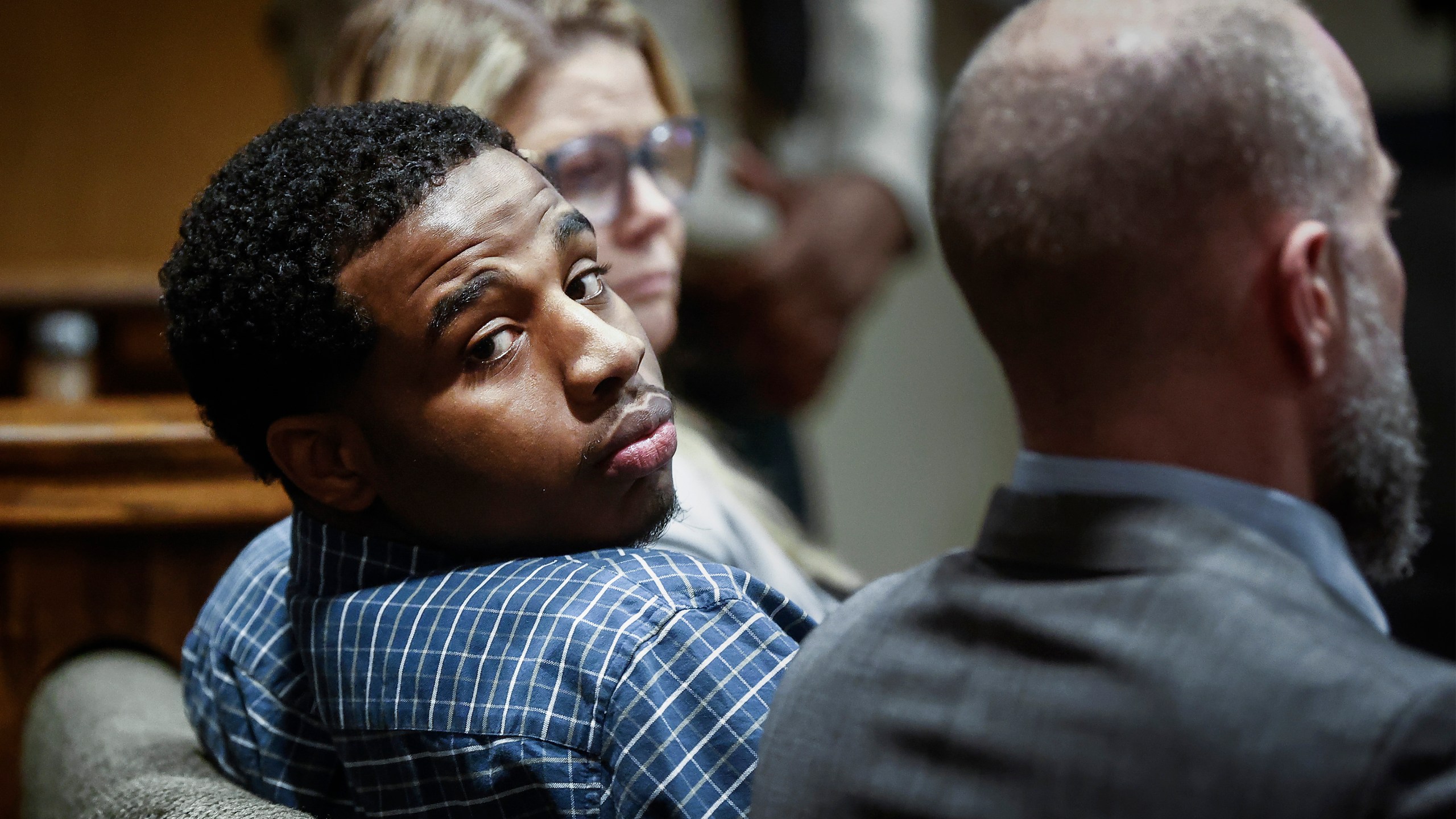 Defendant Justin Johnson, center, was found guilty of murder in the death of Memphis rapper Young Dolph, in court in Memphis, Tenn., on Thursday, Sept. 26, 2024. (Mark Weber/Daily Memphian via AP, Pool)