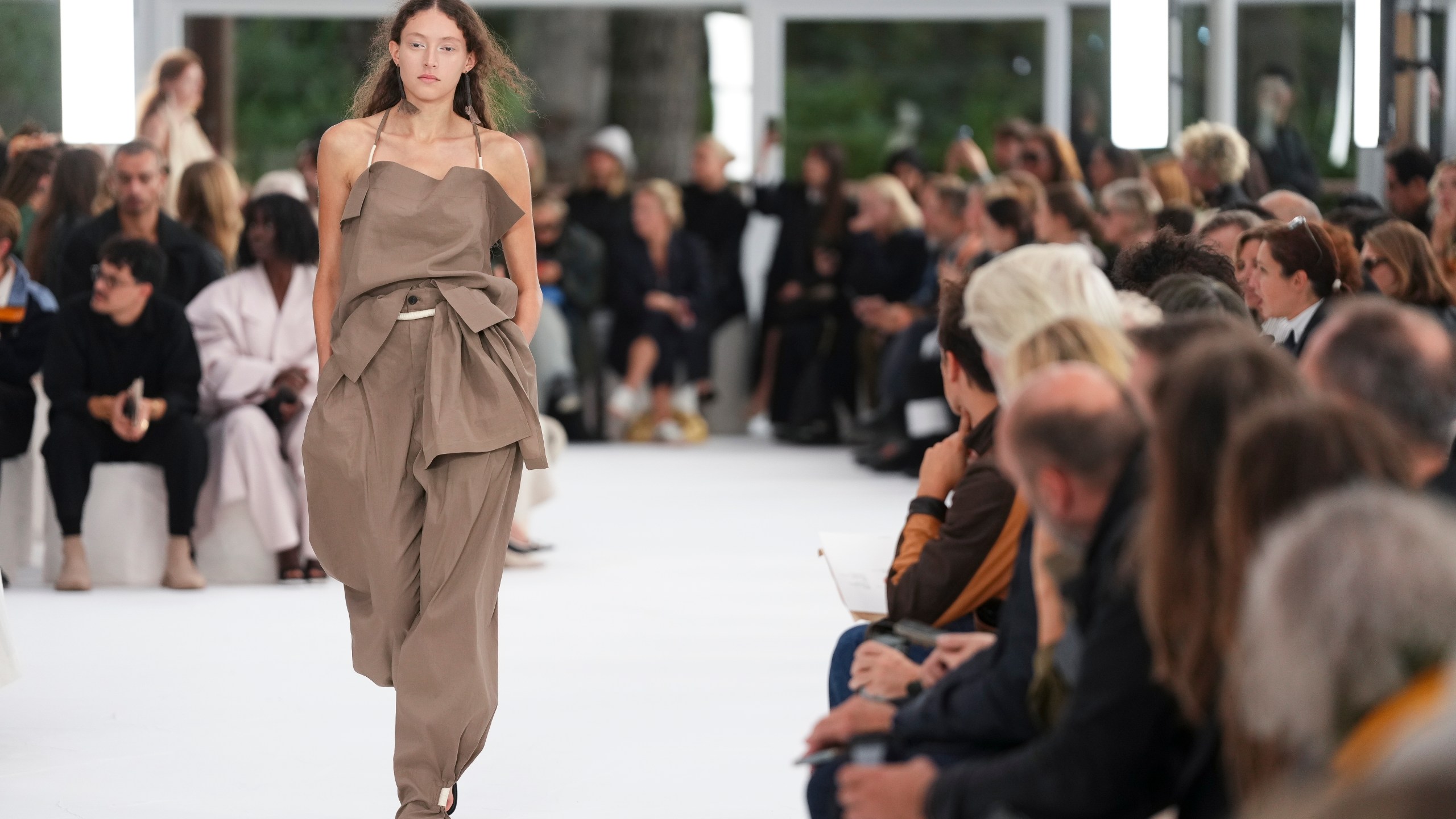 A model wears a creation as part of the Issey Miyake Spring/Summer 2025 collection presented Friday, Sept. 27, 2024 in Paris. (Photo by Scott A Garfitt/Invision/AP)