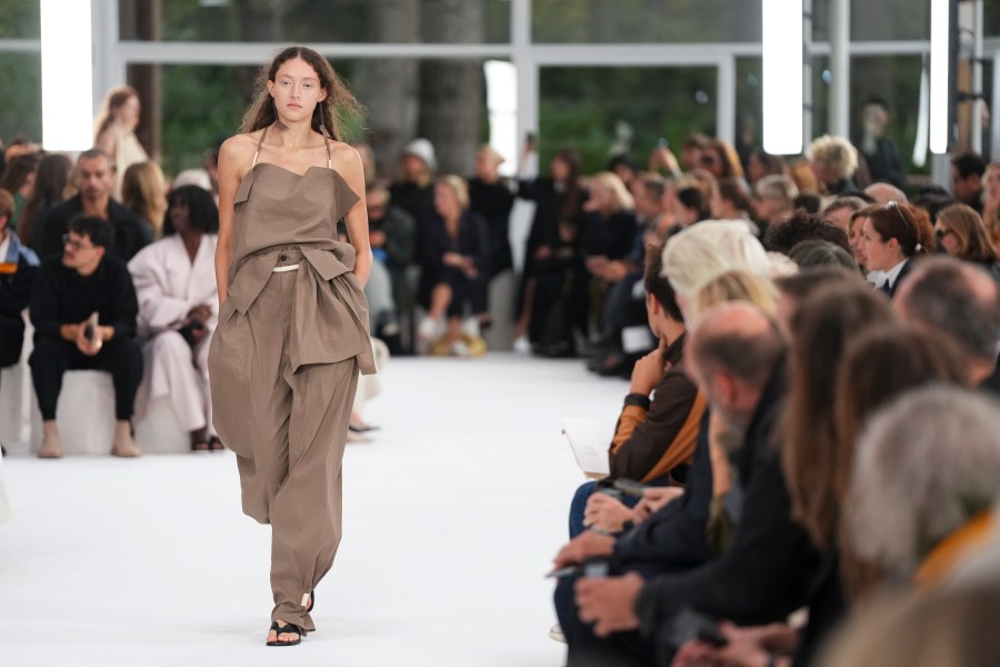 A model wears a creation as part of the Issey Miyake Spring/Summer 2025 collection presented Friday, Sept. 27, 2024 in Paris. (Photo by Scott A Garfitt/Invision/AP)