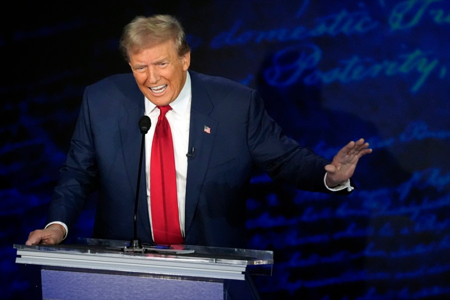 Republican presidential nominee former President Donald Trump speaks during a presidential debate.