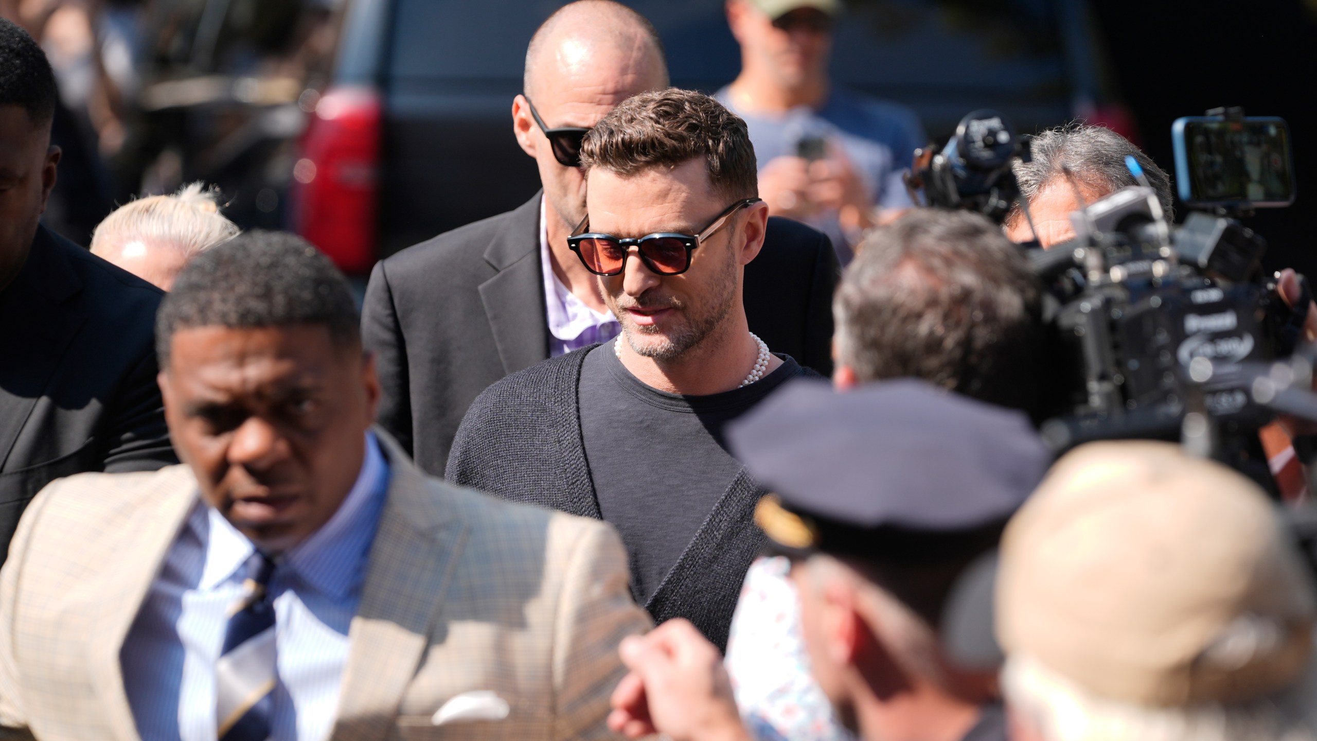 Justin Timberlake, center, walks into court for a hearing, Friday, Sept. 13, 2024, in Sag Harbor, N.Y.