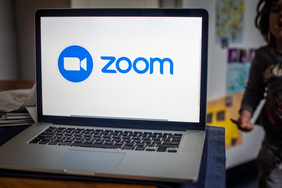 The Zoom Video Communications logo on a laptop computer.